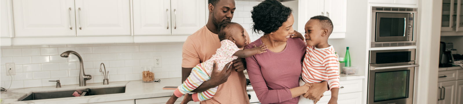 Picture of family in the kitchen.