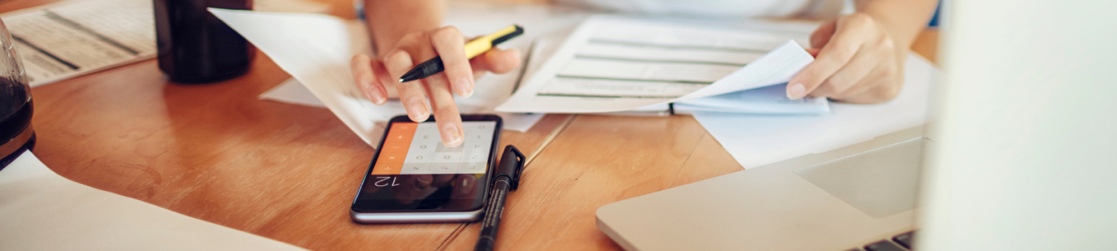 Picture of someone using a calculator.